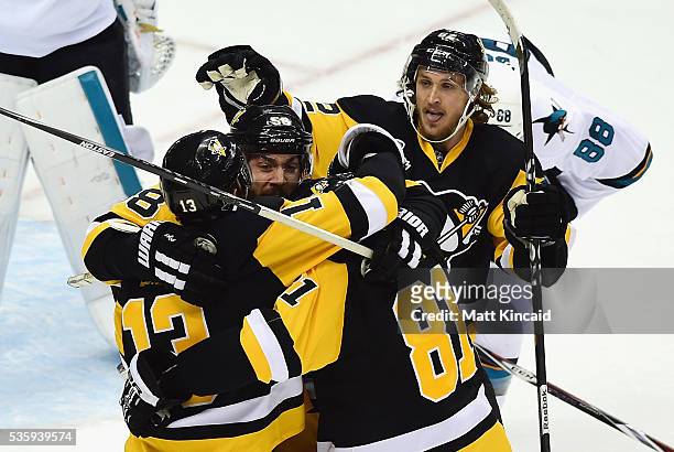 Nick Bonino of the Pittsburgh Penguins celebrates with teammates after scoring a third period goal against the San Jose Sharks in Game One of the...