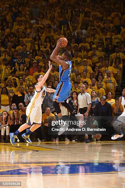 Kevin Durant of the Oklahoma City Thunder shoots against Klay Thompson of the Golden State Warriors during Game Seven of the Western Conference...