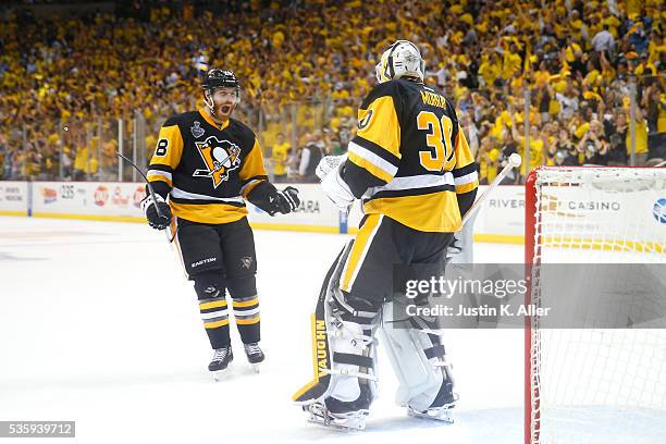 Ian Cole of the Pittsburgh Penguins celebrates with Matt Murray after defeating the San Jose Sharks 3-2 in Game One of the 2016 NHL Stanley Cup Final...