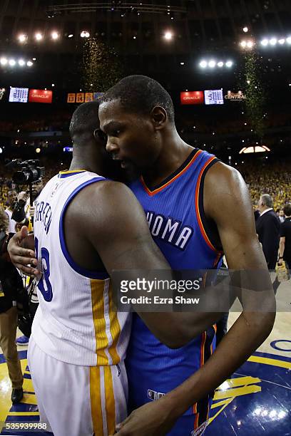 Kevin Durant of the Oklahoma City Thunder hugs Draymond Green of the Golden State Warriors after losing 96-88 in Game Seven of the Western Conference...