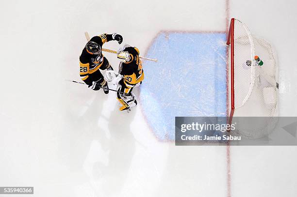 Ian Cole of the Pittsburgh Penguins celebrates with Matt Murray after defeating the San Jose Sharks 3-2 in Game One of the 2016 NHL Stanley Cup Final...