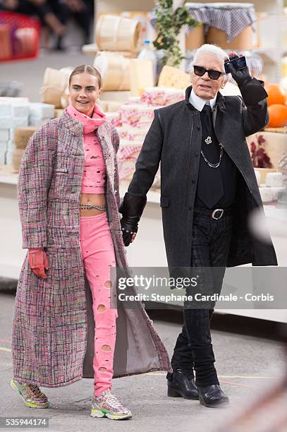 Model Cara Delevigne and Fashion Designer Karl Lagerfeld walk the runway at the end of the Chanel show, as part of the Paris Fashion Week Womenswear...