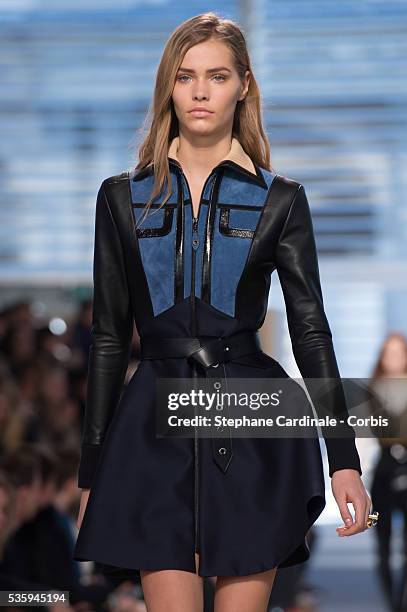 Model walks the runway during the Louis Vuitton show, as part of the Paris Fashion Week Womenswear Fall/Winter 2014-2015, in Paris.