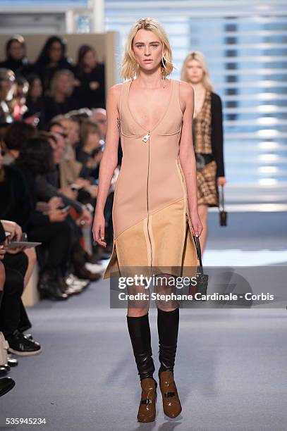 Model walks the runway during the Louis Vuitton show, as part of the Paris Fashion Week Womenswear Fall/Winter 2014-2015, in Paris.