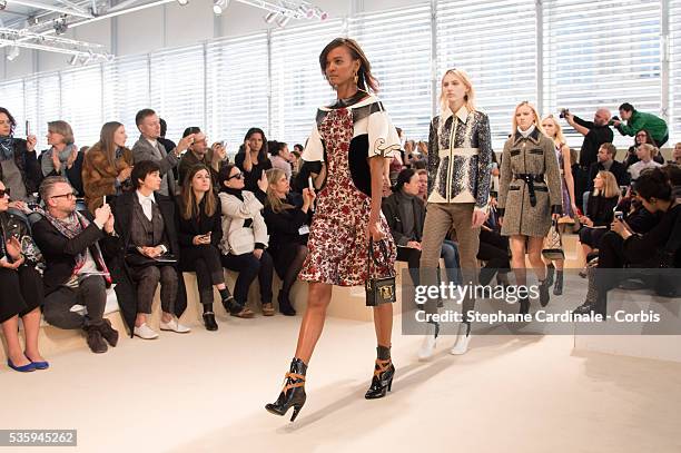 Models walk the runway during the Louis Vuitton show, as part of the Paris Fashion Week Womenswear Fall/Winter 2014-2015, in Paris.