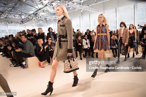 Models walk the runway during the Louis Vuitton show, as part of the Paris Fashion Week Womenswear Fall/Winter 2014-2015, in Paris.