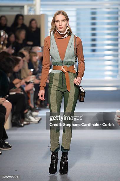 Model walks the runway during the Louis Vuitton show, as part of the Paris Fashion Week Womenswear Fall/Winter 2014-2015, in Paris.