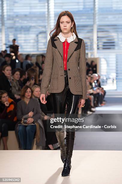 Model walks the runway during the Louis Vuitton show, as part of the Paris Fashion Week Womenswear Fall/Winter 2014-2015, in Paris.