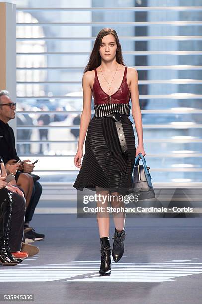 Model walks the runway during the Louis Vuitton show, as part of the Paris Fashion Week Womenswear Fall/Winter 2014-2015, in Paris.