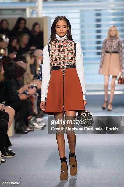 Model walks the runway during the Louis Vuitton show, as part of the Paris Fashion Week Womenswear Fall/Winter 2014-2015, in Paris.