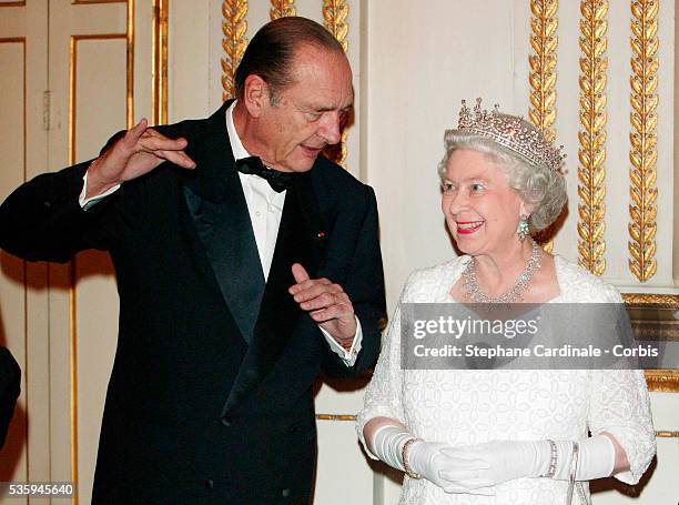 Queen Elizabeth II and Duke of Edinburgh accompanied by French President Jacques Chirac and first Lady Bernadette greet guests as they arrive for a...