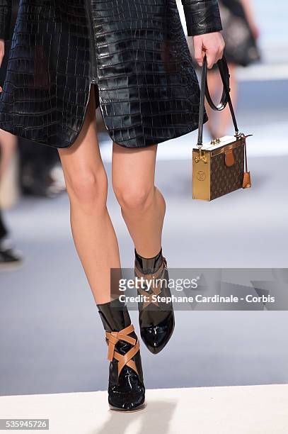 Handbag and shoes detail of a model is seen as she walks the runway during the Louis Vuitton show, as part of the Paris Fashion Week Womenswear...