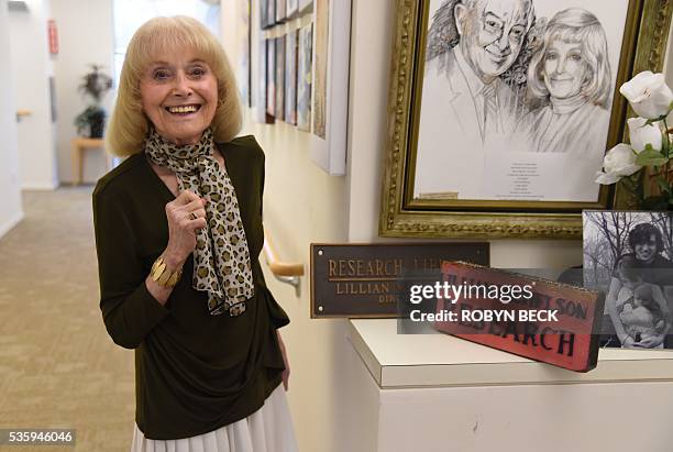 Retired film researcher Lillian Michelson poses outside her home at the Motion Picture Television Fund Country House, a retirement community for...