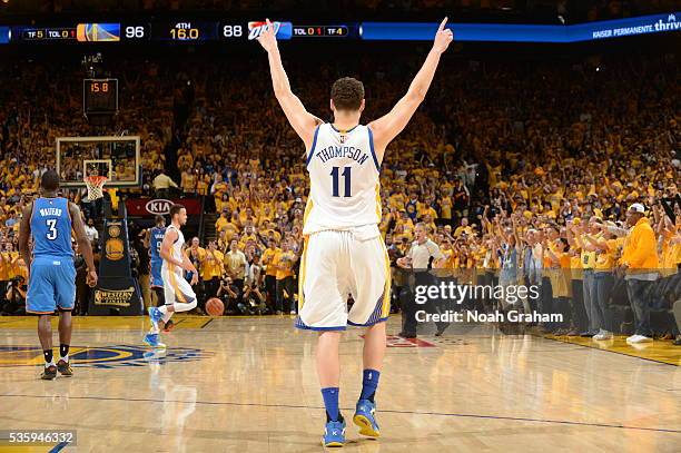 Klay Thompson of the Golden State Warriors celebrates during Game Seven of the Western Conference Finals against the Oklahoma City Thunder during the...