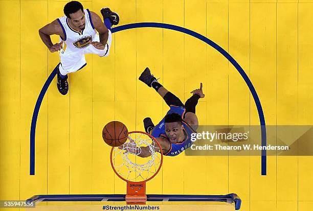 Russell Westbrook of the Oklahoma City Thunder goes up for a layup in front of Shaun Livingston of the Golden State Warriors in Game Seven of the...