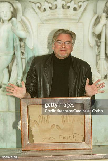 Christian Rauth shows off his handprint at the 2004 Cognac Film Festival.
