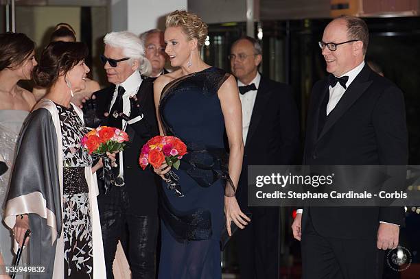 Princess Caroline of Hanover, Karl Lagerfeld, Princess Charlene of Monaco and Prince Albert II of Monaco attend the Rose Ball at Sporting Monte-Carlo...