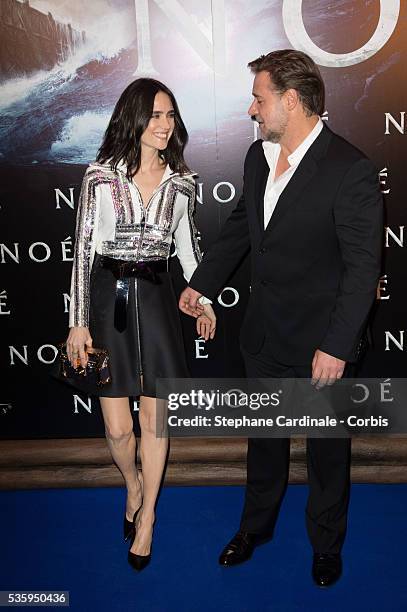 Actors Jennifer Connelly and Russell Crowe pose as they arrive for the Paris premiere of 'Noah' directed by Darren Aronofsky at Cinema Gaumont...