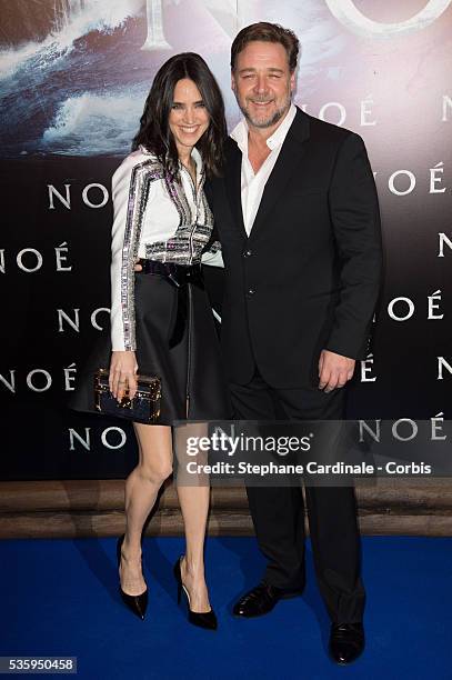 Actors Jennifer Connelly and Russell Crowe pose as they arrive for the Paris premiere of 'Noah' directed by Darren Aronofsky at Cinema Gaumont...