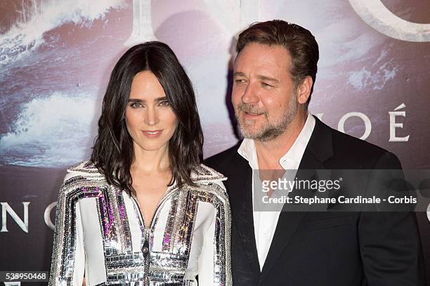Actors Jennifer Connelly and Russell Crowe pose as they arrive for the Paris premiere of 'Noah' directed by Darren Aronofsky at Cinema Gaumont...