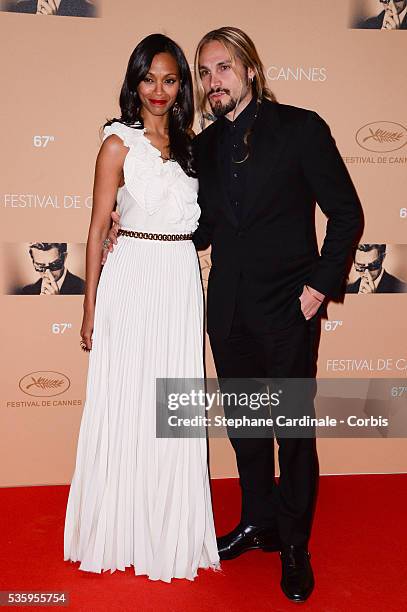 Zoe Saldana and Marco Perego attend the Opening ceremony dinner of the 67th Cannes Film Festival.