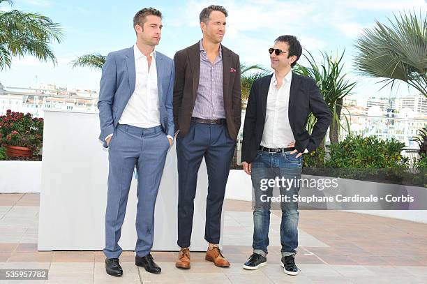 Scott Speedman, Ryan Reynolds and Atom Egoyan attend the "Captives" photocall during the 67th Cannes Film Festival.