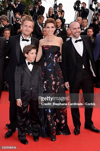 Philippe Lacheau, Enzo Tomasini, Clotilde Courau, Julien Arruti at the "Dragon 2" premiere during the 67th Cannes Film Festival.