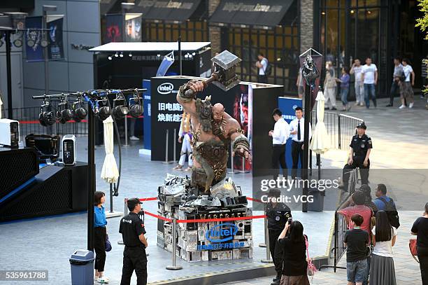 Giant warhammer "hits" at the Sanlitun Square at Beijing Sanlitun on May 30, 2016 in Bejing, China. World of Warcraft and Intel held the campaign as...