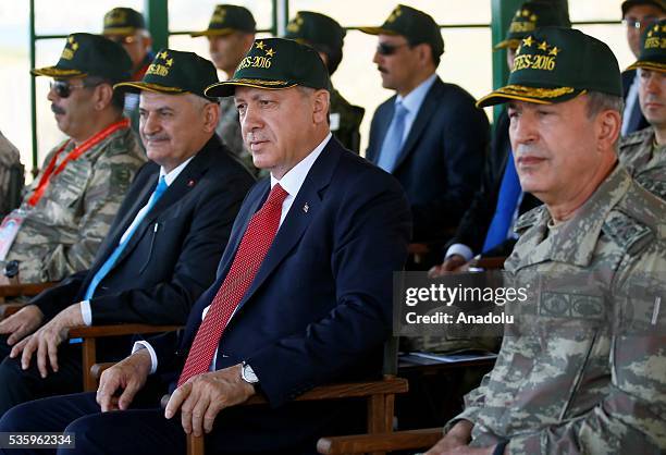 Turkish President Recep Tayyip Erdogan , Turkish Prime Minister Binali Yildirim and Chief of the General Staff of the Turkish Armed Forces, Hulusi...