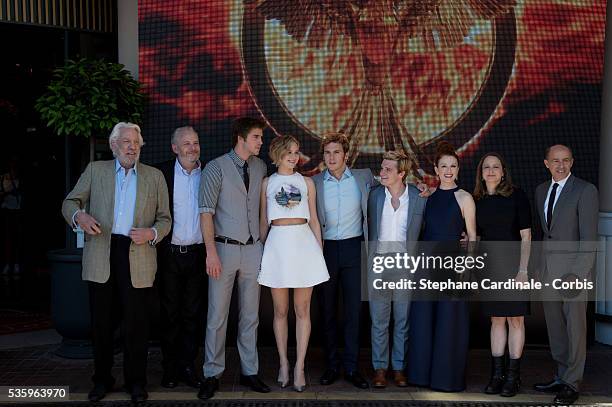 Donald Sutherland, Francis Lawrence, Liam Hemsworth, Jennifer Lawrence, Sam Claflin, Josh Hutcherson, Julianne Moore, Nina Jacobson, producer Jon...