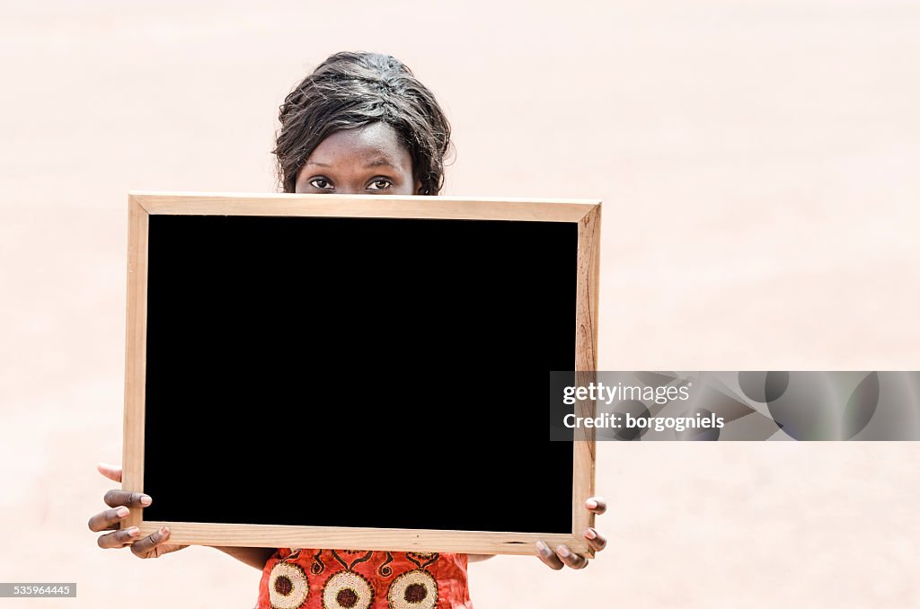 African Ethnicity Mature College Student Holding and Showing Blackboard (Mali)