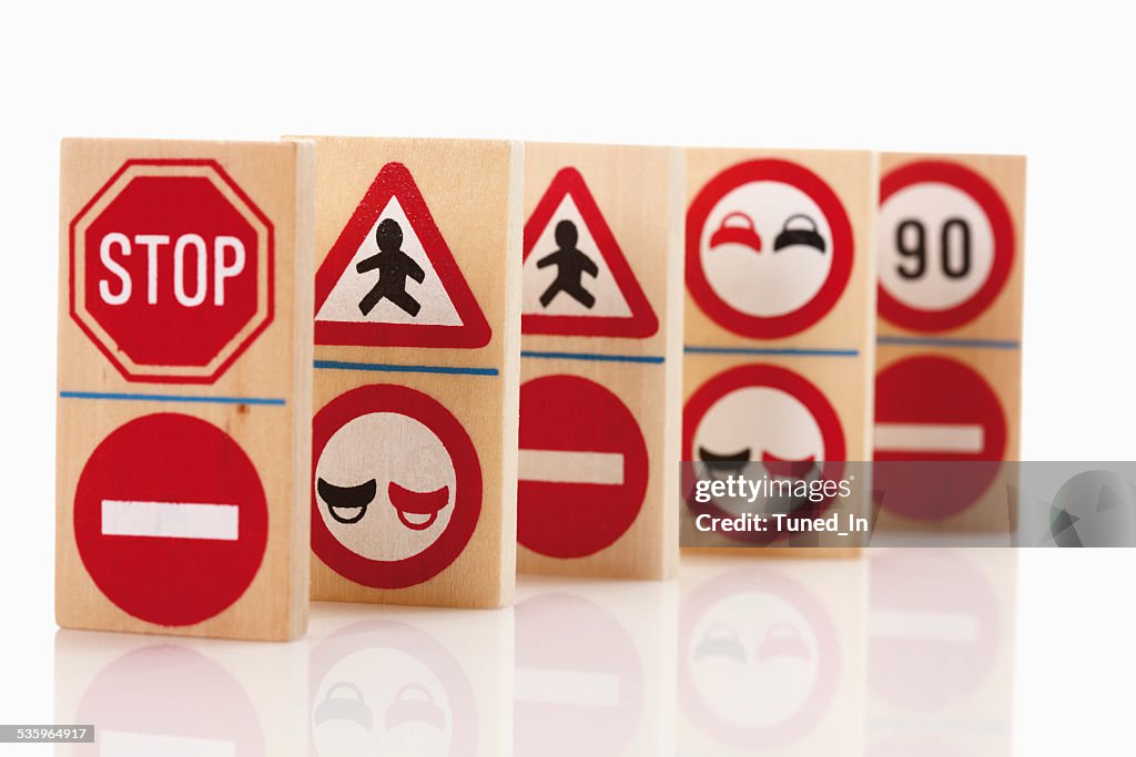 Domino with traffic signs on white background