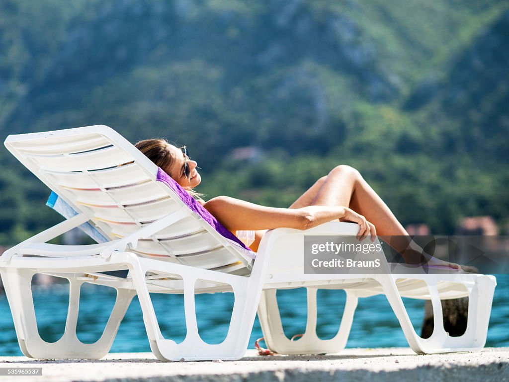 Woman sunbathing.