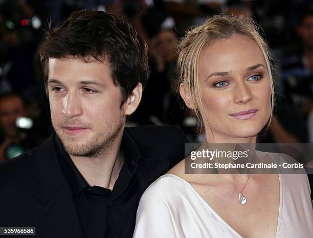 Actor Guilaume Canet with wife and actress Diane Kruger at the photocall of "Joyeux Noel" during the 58th Cannes Film Festival.