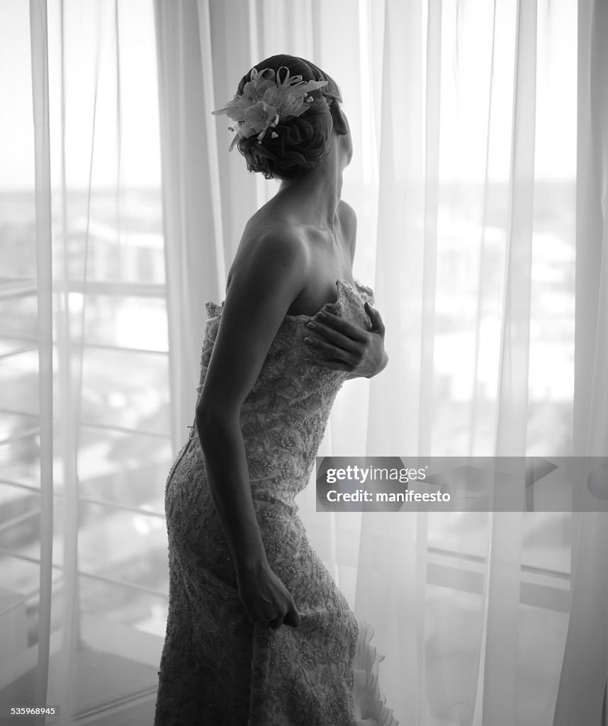 Beautiful bride wearing gorgeous dress.