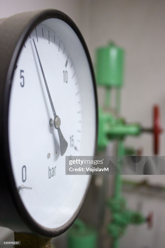 Close up photo of manometer with valve