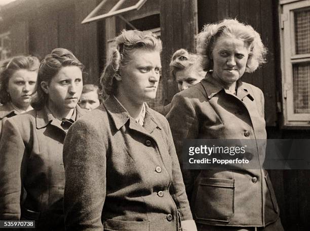 Some of the female guards at the Bergen-Belsen Nazi concentration camp, including Herta Bothe, right, and Irma Grese, nearest camera, near the German...
