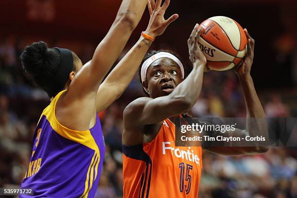 Aneika Henry-Morello of the Connecticut Sun is defended by Candace Parker of the Los Angeles Sparks during the Los Angeles Sparks Vs Connecticut Sun,...