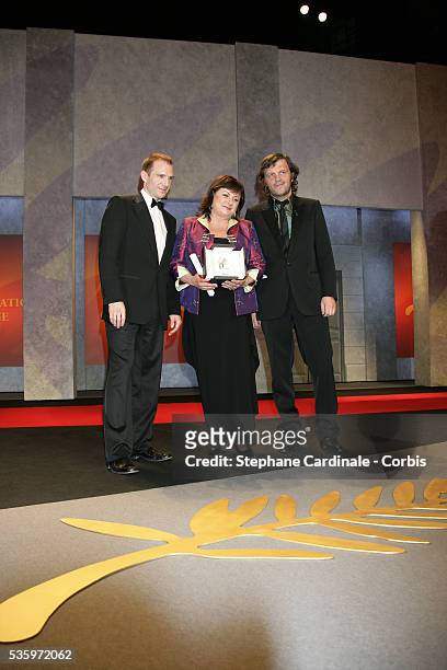 Director Emir Kusturica, actor Ralph Fiennes and actress Hanna Laslo with her award for "Best Female Actress" at the closing ceremony of the 58th...