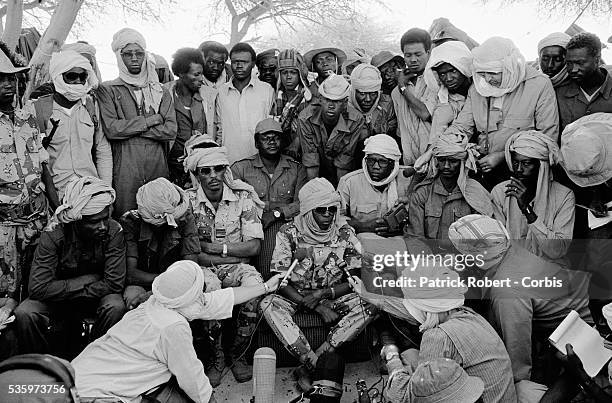 Soldiers of FANT , the Chadian National Army, gather around their leader Idriss Deby during a press conference after reconquering the...