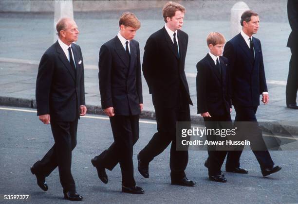 Prince Philip, the Duke of Edinburgh, Prince William, Earl Spencer, Prince Harry and Prince Charles, the Prince of Wales follow the coffin of Diana,...