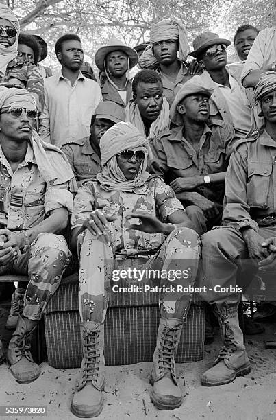 Soldiers of FANT , the Chadian National Army, gather around their leader Idriss Deby during a press conference after reconquering the...