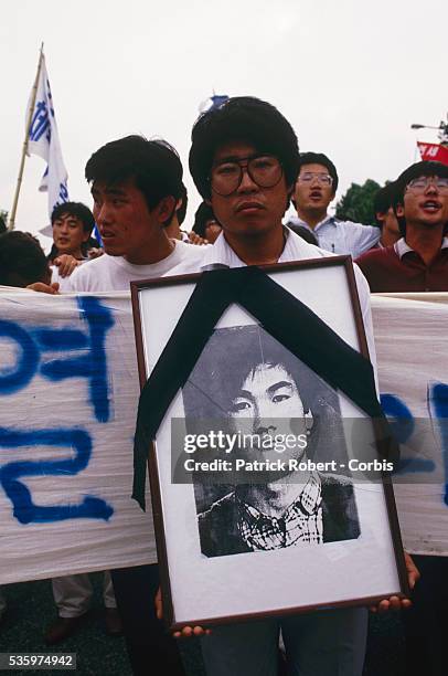 Demonstrators protest at Yousei University in Seoul after the death of a student during a riot. During this time, students and other demonstrators...