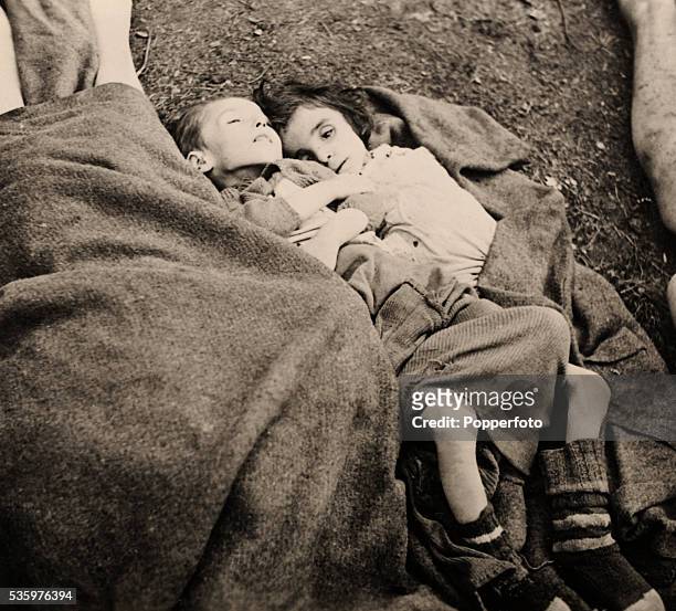 Two sick and malnurished Jewish children found by British troops who liberated the Belsen Concentration camp, 15th April 1945. The Royal Army Medical...