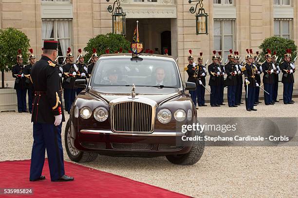 The car of Queen Elizabeth II arrives at the Elysee Palace for a State dinner in honor of Queen Elizabeth II, hosted by French President Francois...