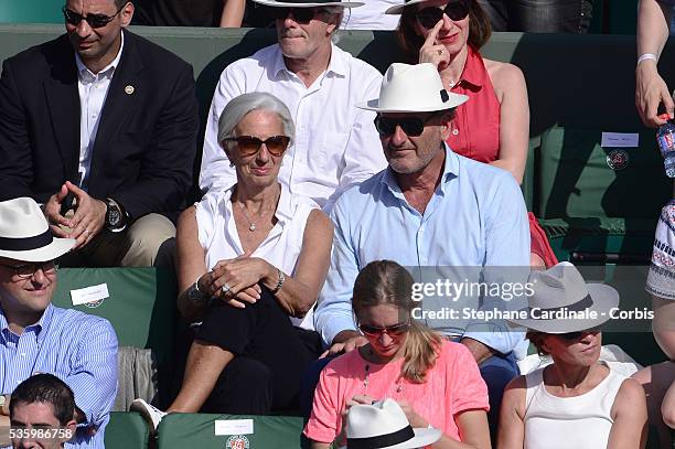 Managing Director Christine Lagarde and her husband Xavier Giocanti attend the Roland Garros French Tennis Open 2014 - Day 14 at Roland Garros on...