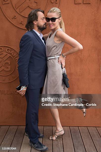 Henri Leconte and his Wife Florentine attend the Roland Garros French Tennis Open 2014.