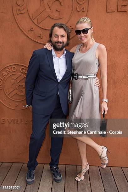 Henri Leconte and his Wife Florentine attend the Roland Garros French Tennis Open 2014.