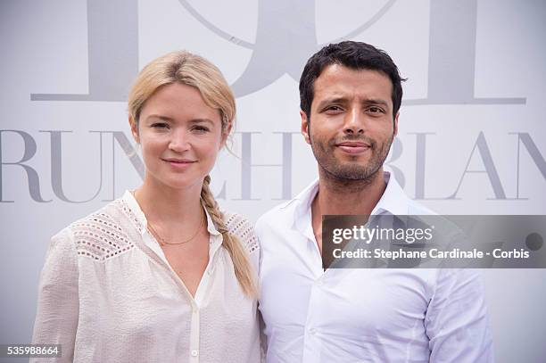 Virginir Efira and Mabrouk El Mechri attend the 'Brunch Blanc' hosted by Barriere Group. Held on Yacht 'Excellence' on June 29, 2014 in Paris, France.