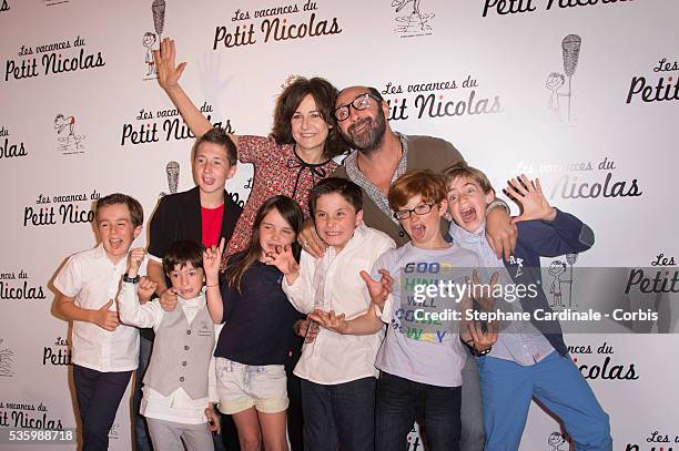 Valerie Lemercier, Kad Merad, Matheo Boisselier and his friends attend the 'les vacances du petit Nicolas' Premiere at Cinema Gaumont Capucine, in...